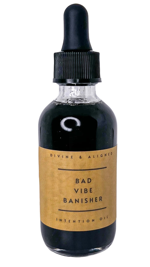 Bottle labeled 'Bad Vibe Banisher' on a white background